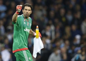 Juventus goalkeeper Gianluigi Buffon gestures at half time during the Champions League group D soccer match between Manchester City and Juventus at the Etihad Stadium, Manchester, England, Tuesday, Sept. 15, 2015. (ANSA/AP Photo/Jon Super)